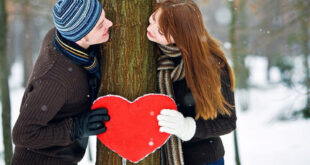 Romantični par po zimi za Valentinovo
